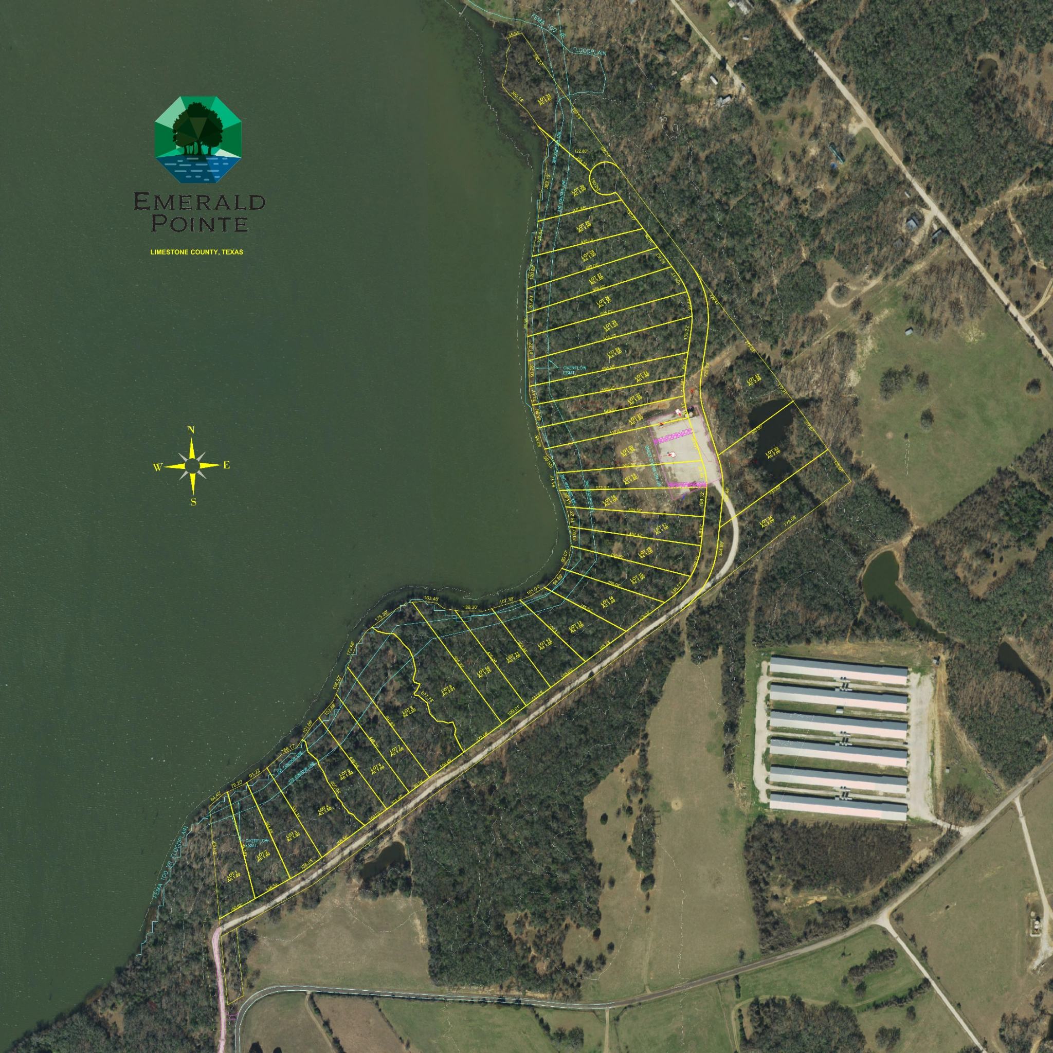 Full Emerald Pointe community aerial showing the lakefront subdivision, original lot boundaries, and surrounding countryside